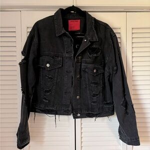 Distressed denim jacket. Size S